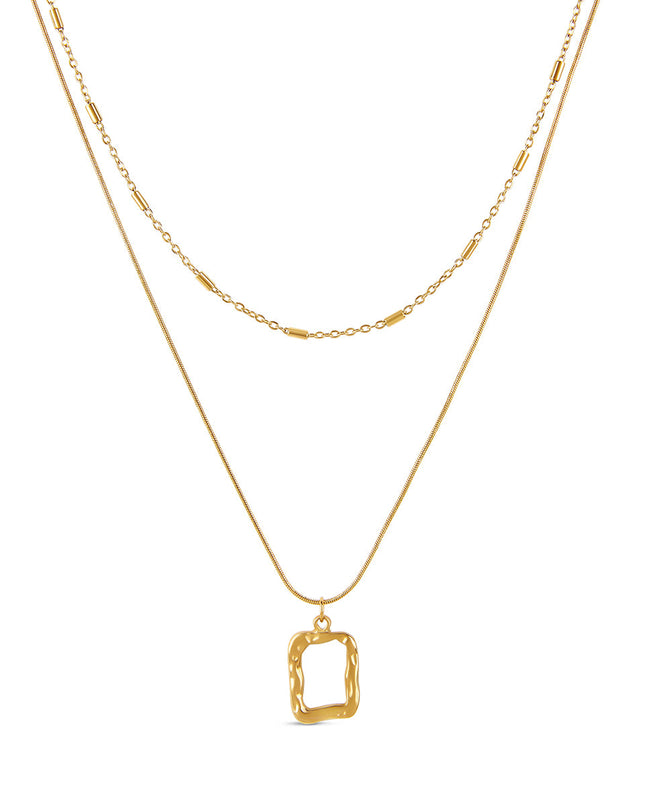 Collar de Capa con Colgante Escultórico - Acabado en Oro
