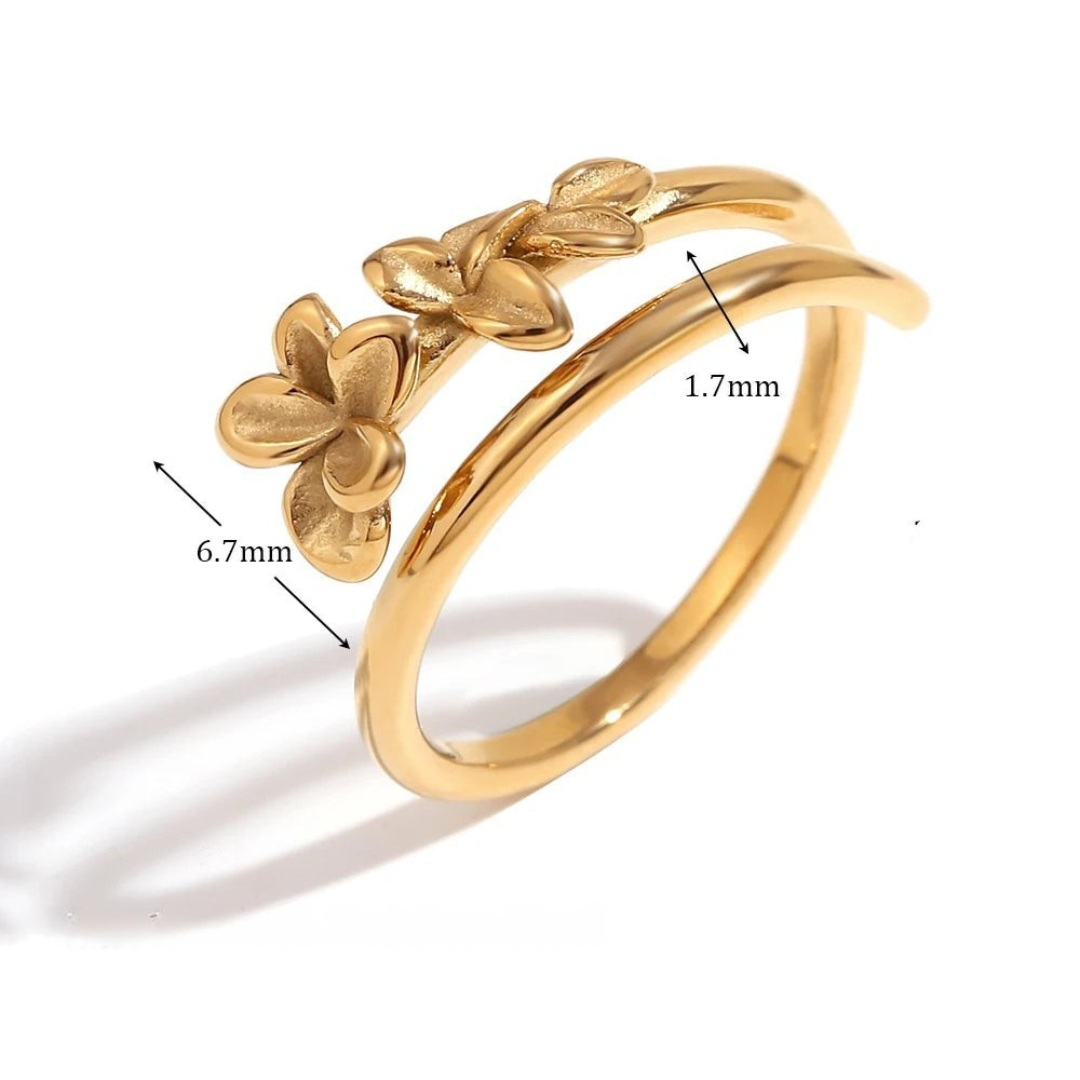 Anillo Dorado de Estilo Trenzado con Circón y Flores
