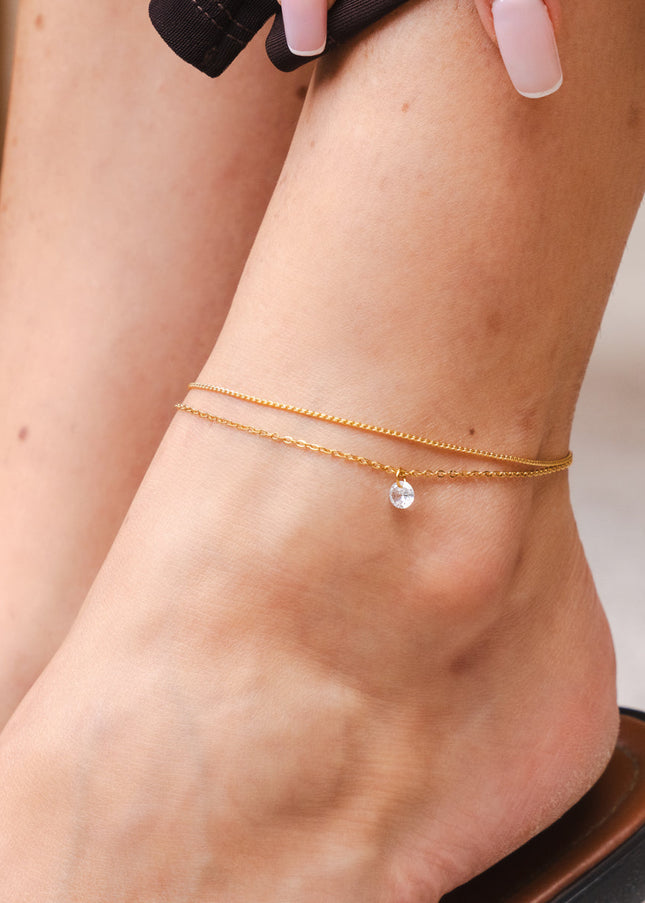 Tobillera de Doble Cadena con Caída de Piedra