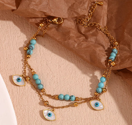 E.B.belle Tres ojos de concha blanca Piedra turquesa azul Cadenas de pies de doble capa Tobillera de acero inoxidable 316L chapada en oro de 18 quilates