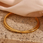 Brazalete Minimalista de Doble Línea en Acero Inoxidable