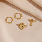 Pendientes Asimétricos con Cerradura de Corazón y Ángel
