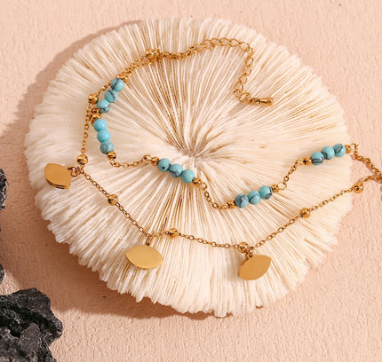 E.B.belle Tres ojos de concha blanca Piedra turquesa azul Cadenas de pies de doble capa Tobillera de acero inoxidable 316L chapada en oro de 18 quilates
