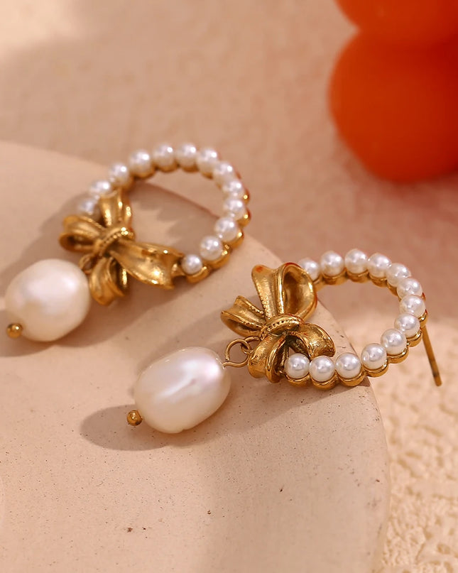 E.B.belle-collar con colgante de lazo de perlas y borlas, decoración chapada en oro de 18K, impermeable, joyería de acero inoxidable 316L