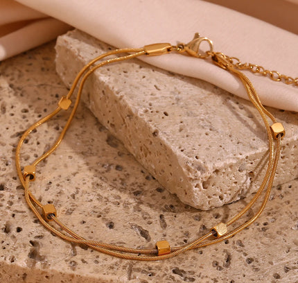 E.B.belle Tobilleras hipoalergénicas de acero inoxidable 316L chapadas en oro de 18 quilates para mujer, pulsera de pies con cadena de serpiente de doble capa en la pierna