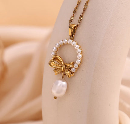 E.B.belle-collar con colgante de lazo de perlas y borlas, decoración chapada en oro de 18K, impermeable, joyería de acero inoxidable 316L